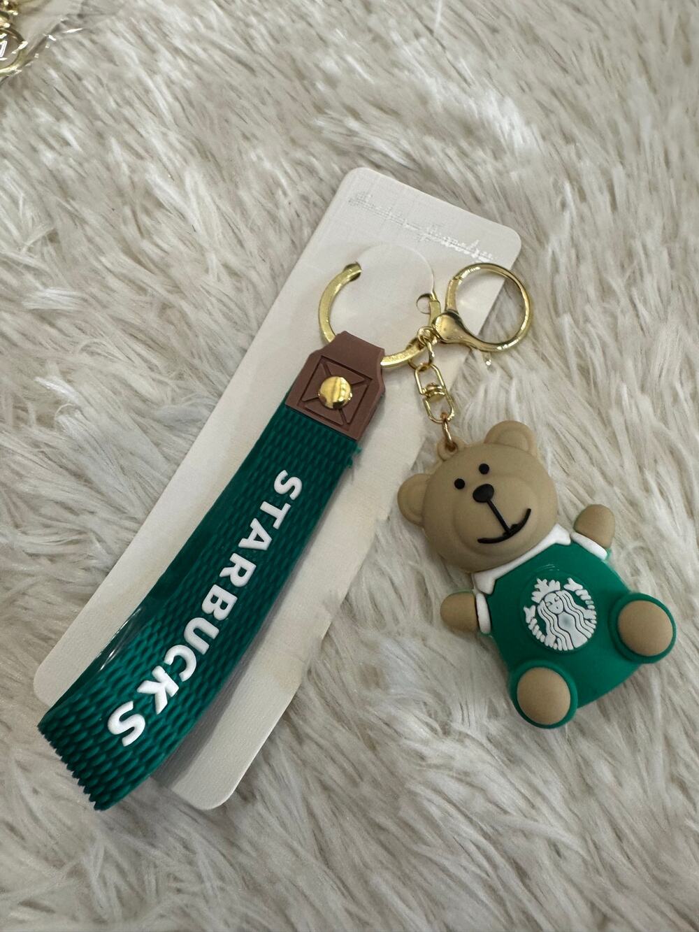 Starbucks green bear keychain with white logo and strap gold metal